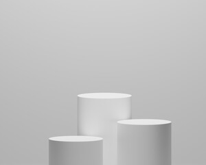 Three White Cylindrical Podiums
