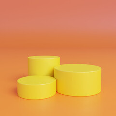 Three yellow cylindrical podiums on an orange surface