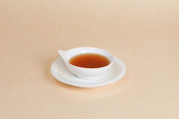 White cups and plates filled with Chinese medicine