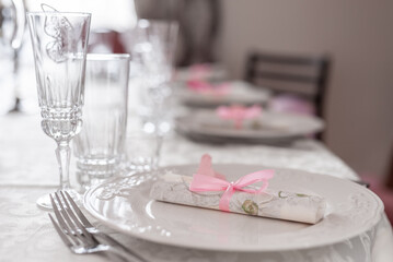 Elegant Wedding Table Setting with Pink Accent for Special Occasions
