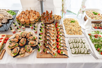 Assortment of Elegant Wedding Party Buffet Foods Arranged on a Decorative Table