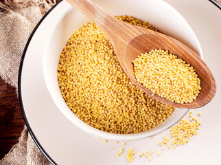 Millet seeds in plates.