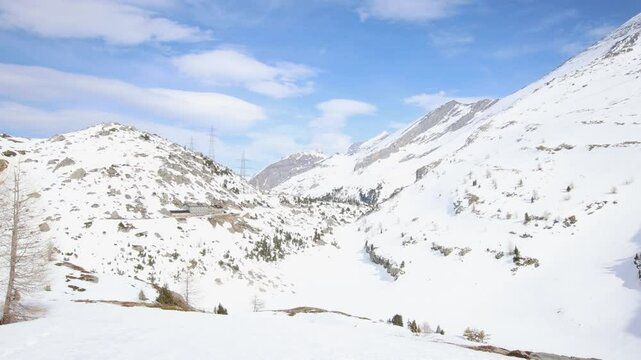 Mountain pass in snow covered alps, establisher