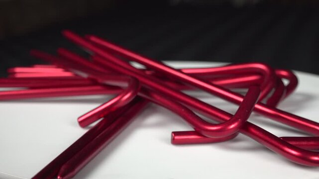 Close shot of a bunch of MSR tent pegs