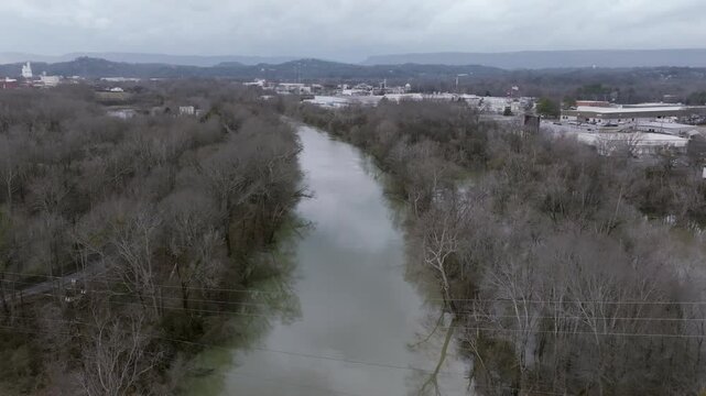 Aerial drone footage flying over south Chickamauga creek before it enters the Tennessee River during winter.
