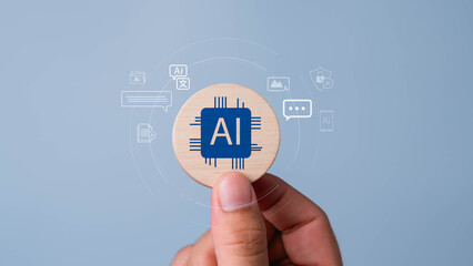 Artificial intelligence technology used to manage work, documents, images, security, translation, communication and research, AI concept, hand holding wooden blocks with Ai icon
