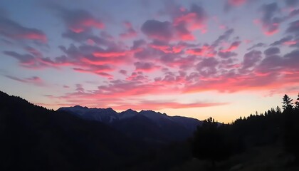 Fototapeta premium Majestic mountains and a vibrant sky create a serene and breathtaking landscape