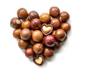 macadamia nuts in heart shape on white background