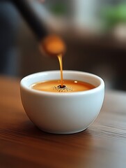 Espresso Pouring Into Cup