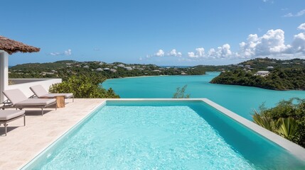 Fototapeta premium Serene Luxury Pool Overlooking Vibrant Turquoise Water in Paradise