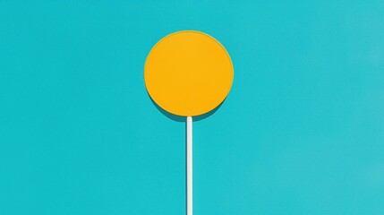 A yellow circle on a white pole.