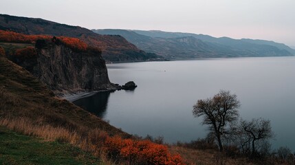 Serene Coastal Landscape with Autumn Foliage Along Tranquil Waters