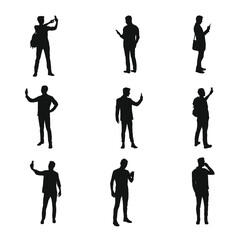 Silhouette of a man using a smartphone