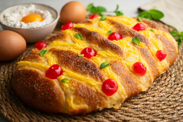 Coca San Juan, a traditional Catalan dessert similar to brioche with pastry cream and candied...