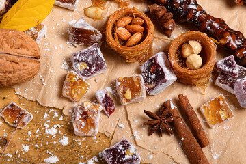 Sweet food Turkish delight on wooden background, assorted locum and candy as decorated backdrop