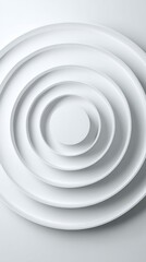 Obraz premium Minimalist White Concentric Circles Ascending in a Clean Design with Soft Shadows and a Smooth Texture Creating a Modern and Serene Visual