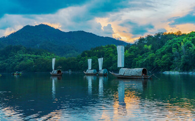 Mountains, Oujiang River, fishing boats, and ancient towns in Lishui City, Zhejiang Province, China On May 24th, 2024	