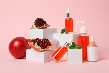 Self care and skincare products concept - pomegranate cosmetics