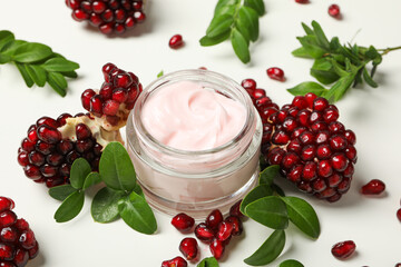 Self care and skincare products concept - pomegranate cosmetics