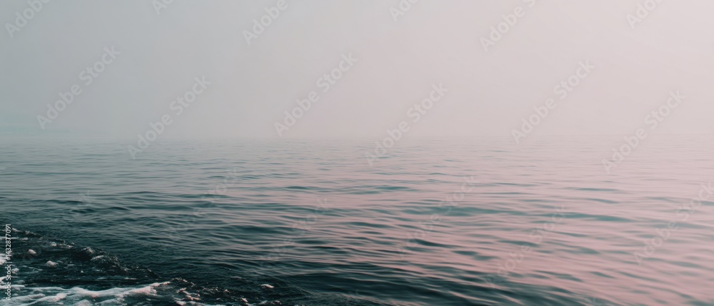 Poster serene expanse of calm ocean water under a hazy sky creating a peaceful and tranquil atmosphere with