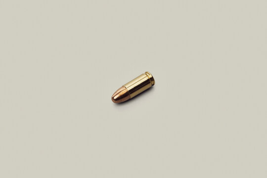 Studio shot 9 x 19mm bullet on white background
