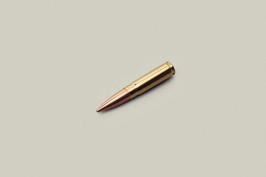 Studio shot .300 bullet cartridge on white background
