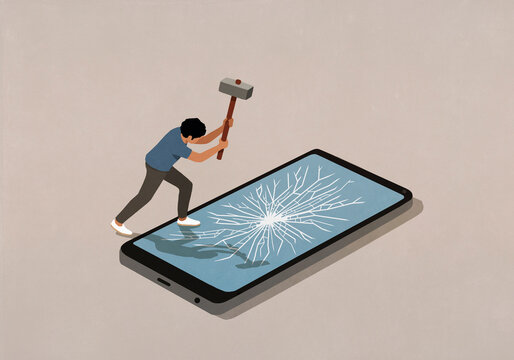 Man with sledgehammer smashing smart phone screen
