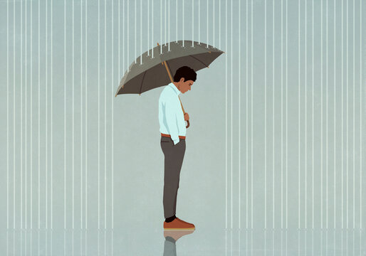 Umbrella protecting depressed man from rain
