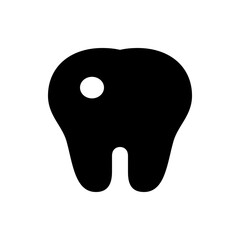 Illustration of a black tooth with a cavity represented by a white circle on the tooth surface area
