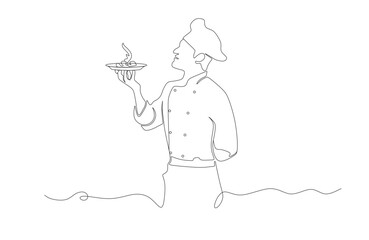 male chef with a plate of food