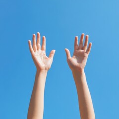 Hands raised to the sky