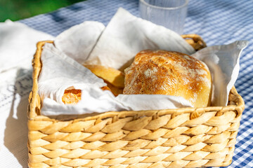 bread basket on a gingham tablecloth