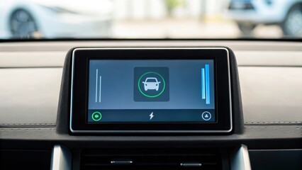 Obraz premium Digital dashboard displaying vehicle settings in a modern electric car interior.