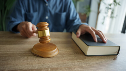 Lawyer working with lawbook Justice and law concept.