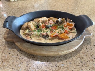 Creamy Chicken and Vegetable Skillet in Rustic Cast Iron Pan