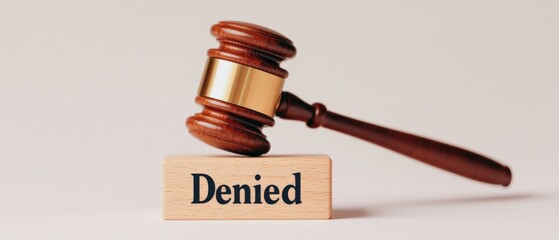 Gavel on a block says denied