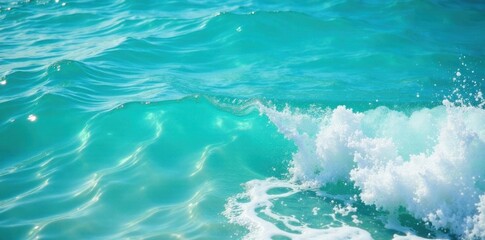Obraz premium Close-up of turquoise water with sea foam and ocean waves, beach, water