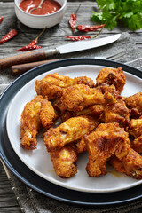 crispy fried chicken wings on a plate
