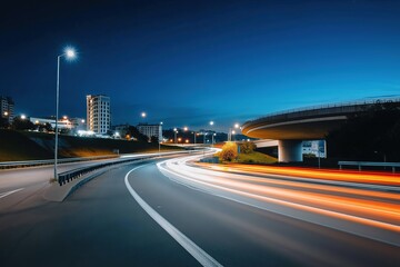 Dynamic night scene of city highway with light trails and modern architecture