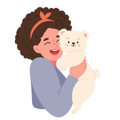 Curly girl holding a curly dog. Adorable pet owners and cute domestic animals.