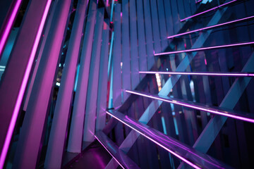 Futuristic Neon-Lit Staircase with Vibrant Purple and Blue Accents in Urban Setting