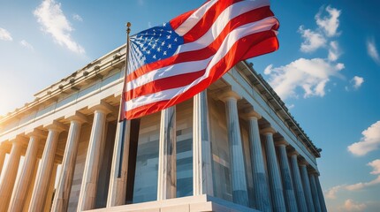 Fototapeta premium American flag waving in front of the lincoln memorial on a sunny day with a blue sky and white clouds
