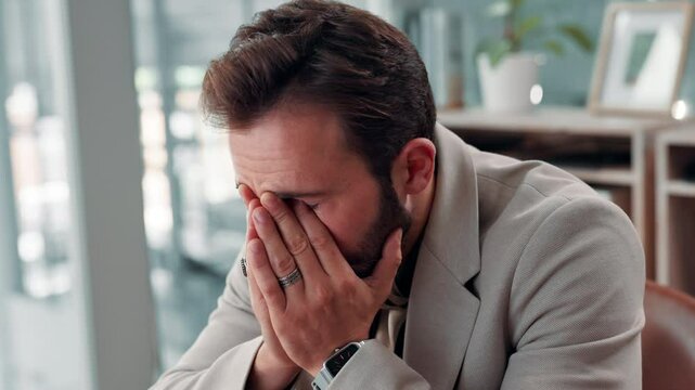 Burnout, stress or typing and business man in office with pressure or tension for deadline. Computer, fatigue or migraine and overworked employee in corporate workplace with symptoms of exhaustion