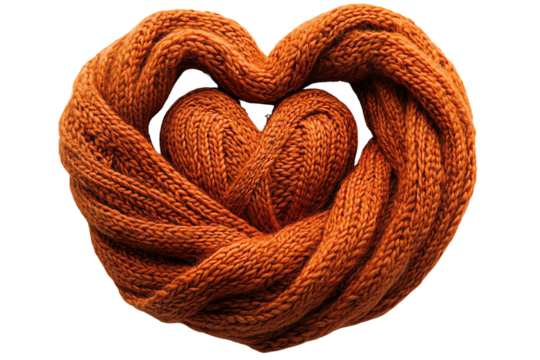 A cozy knitted heart shape made from soft orange yarn, symbolizing warmth and affection against a white background.