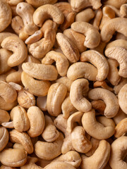 Full frame Cashew nuts background. Vegetarian Organic Healthy snack concept.