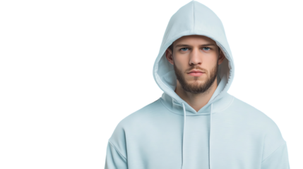 A young man wearing a light blue hoodie, looking serious and contemplative against a white background.