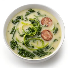Caldo Verde soup in bowl on white background 