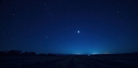 Naklejka premium Starry night sky with a few twinkling stars on a dark background, , night sky