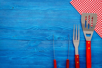 Steel barbecue and grill tools, top view. Equipment for picnic