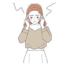 騒音に耳を塞いでいる女性